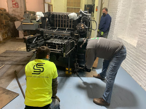 sullivan Industrial Team Relocating a Printing machine